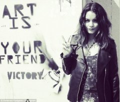 Peace out: Vanessa shared an Instagram photo on Sunday of herself in the motorcycle jacket by Luv Aj