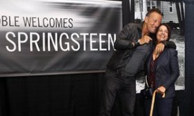 Bruce Springsteen, left, greets a fan at the launch of his autobiography at the Barnes & Noble in the New Jersey town where he grew up.