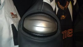 Exterior titanium shoulder protector
